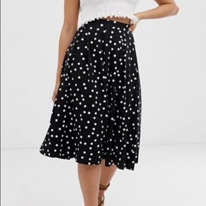 Midi skirt with box pleat in polka dot print